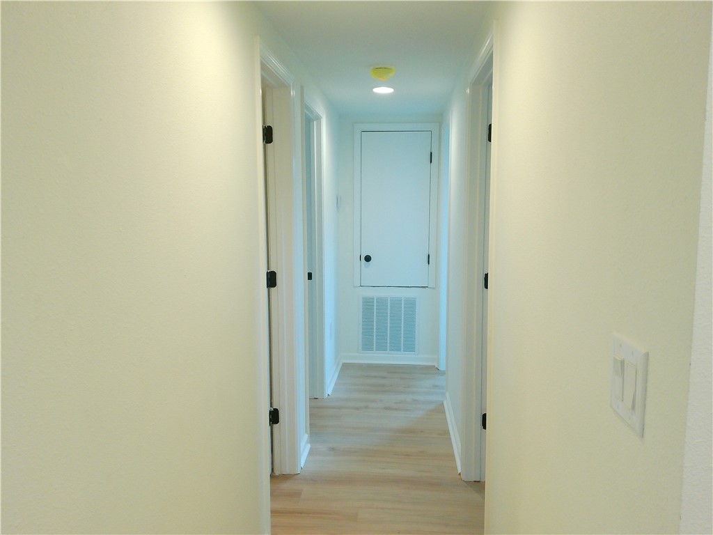 306 Allison Drive Gregory, TX 78359 - Photo 5 of 15 a view of a bathroom from the hallway