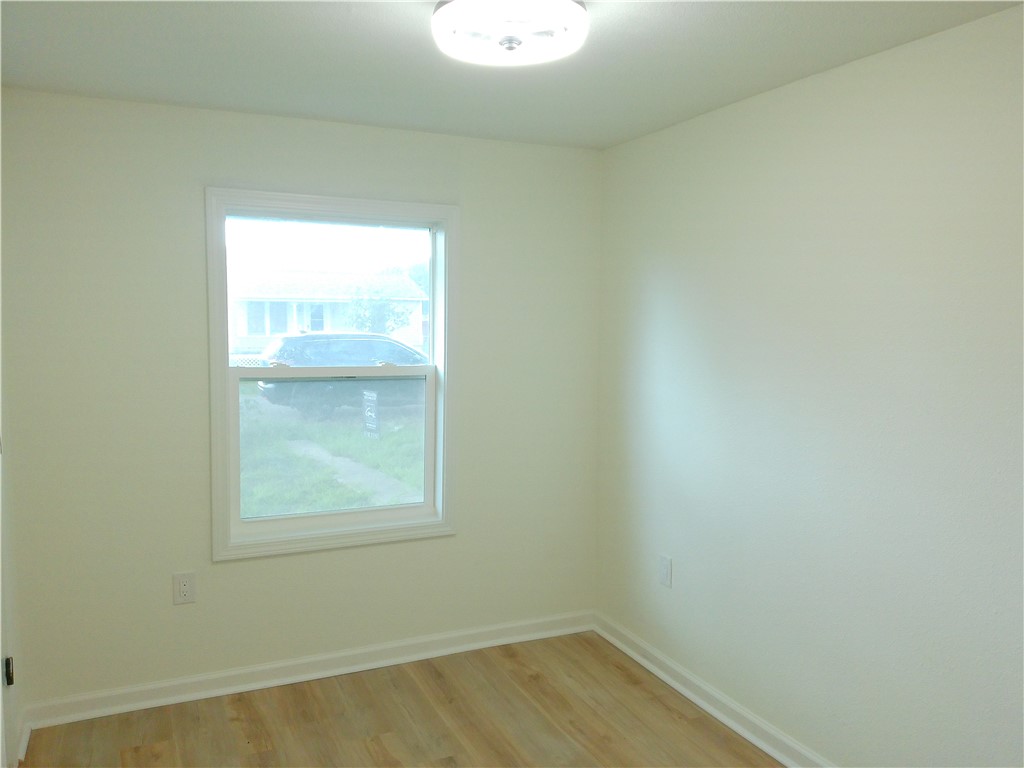 306 Allison Drive Gregory, TX 78359 - Photo 6 of 15 an empty room with a window