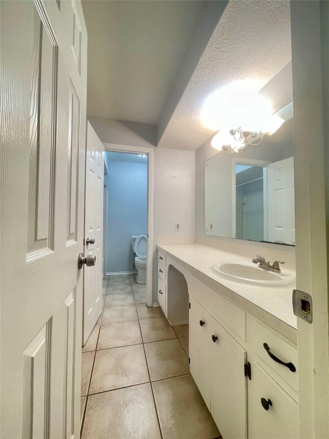 811 Tori Road Richmond, TX 77469 - Photo 13 of 14 a bathroom with a double vanity sink mirror and