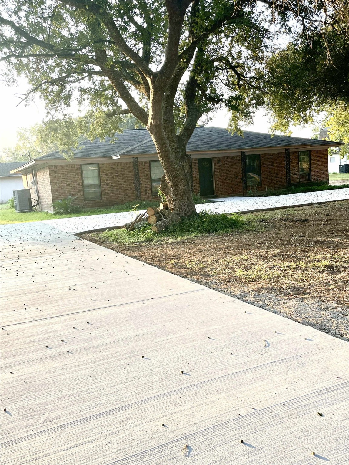 811 Tori Road Richmond, TX 77469 - Photo 2 of 14 a front view of a house with a yard and a garage