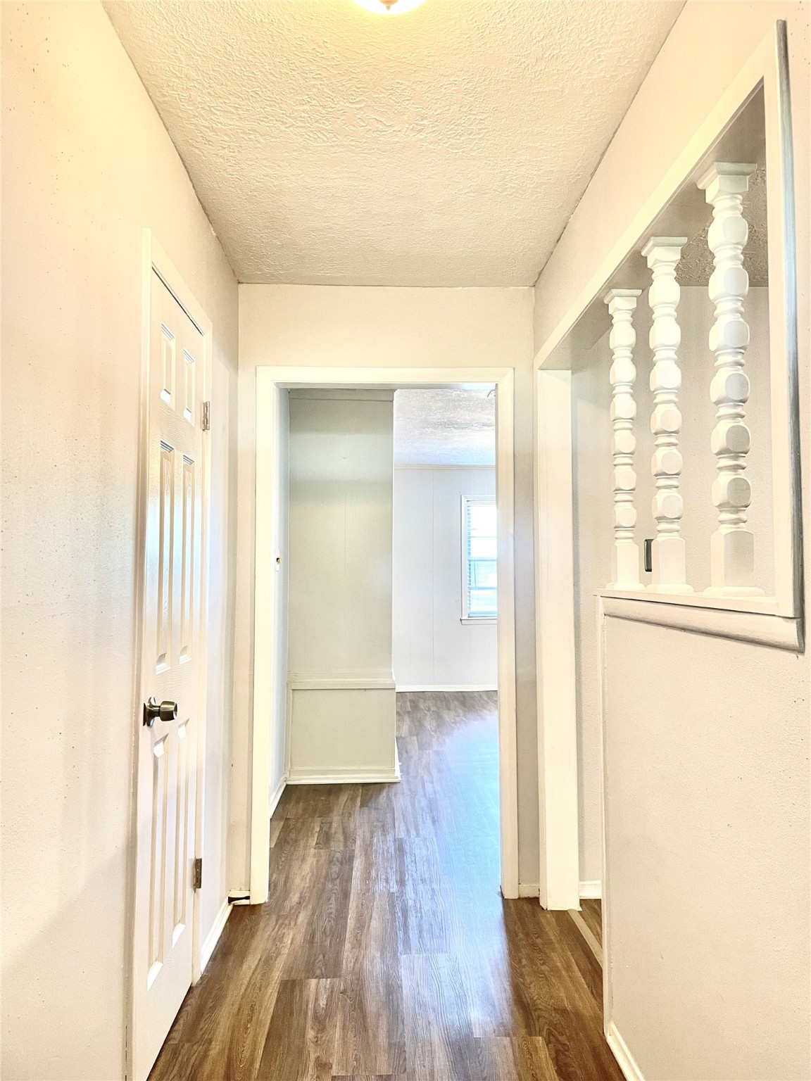 811 Tori Road Richmond, TX 77469 - Photo 3 of 14 a view of hallway with wooden floor