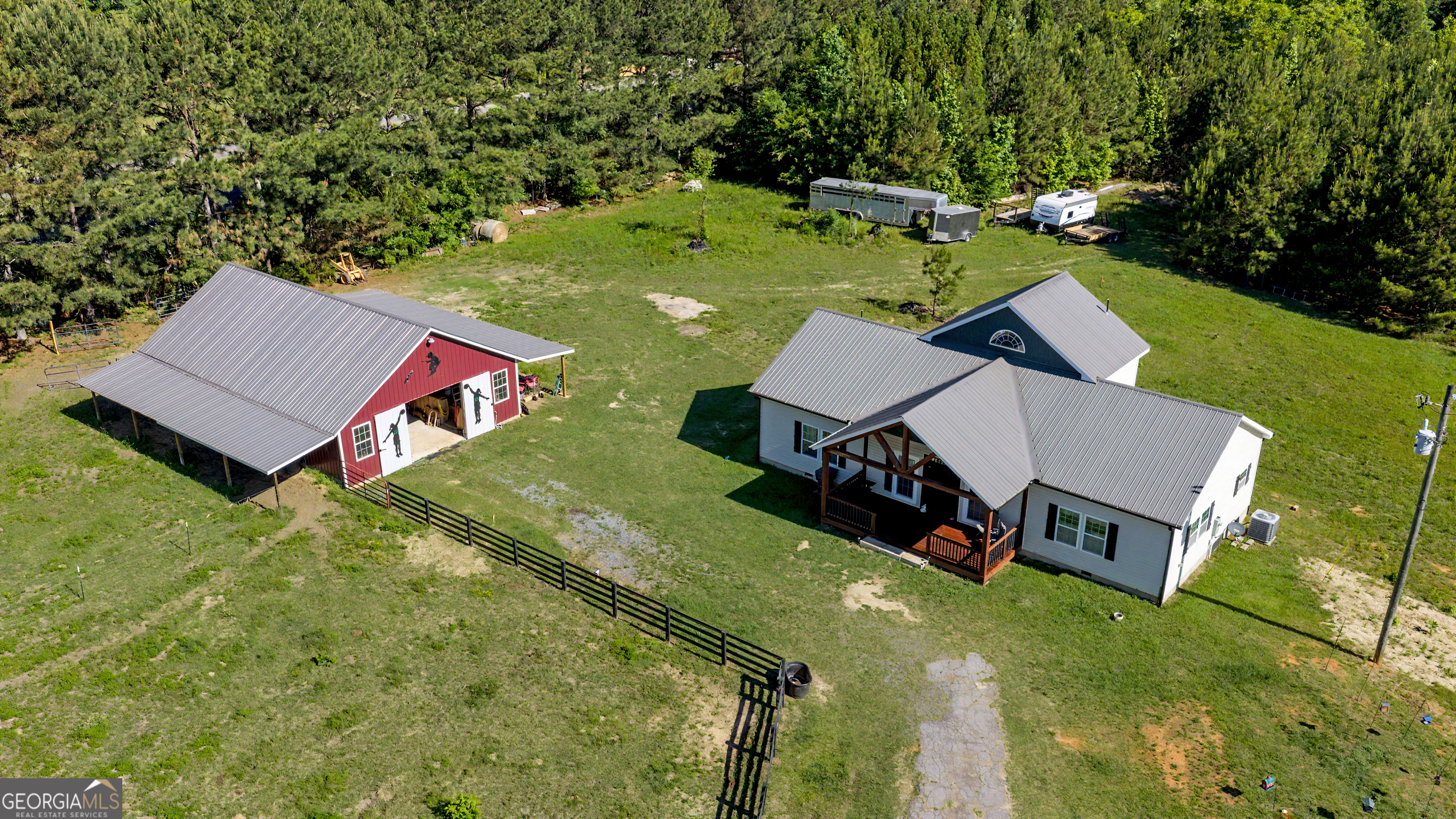 213 Fredonia Church Road Barnesville, GA 30204 - Photo 2 of 32 an aerial view of a house