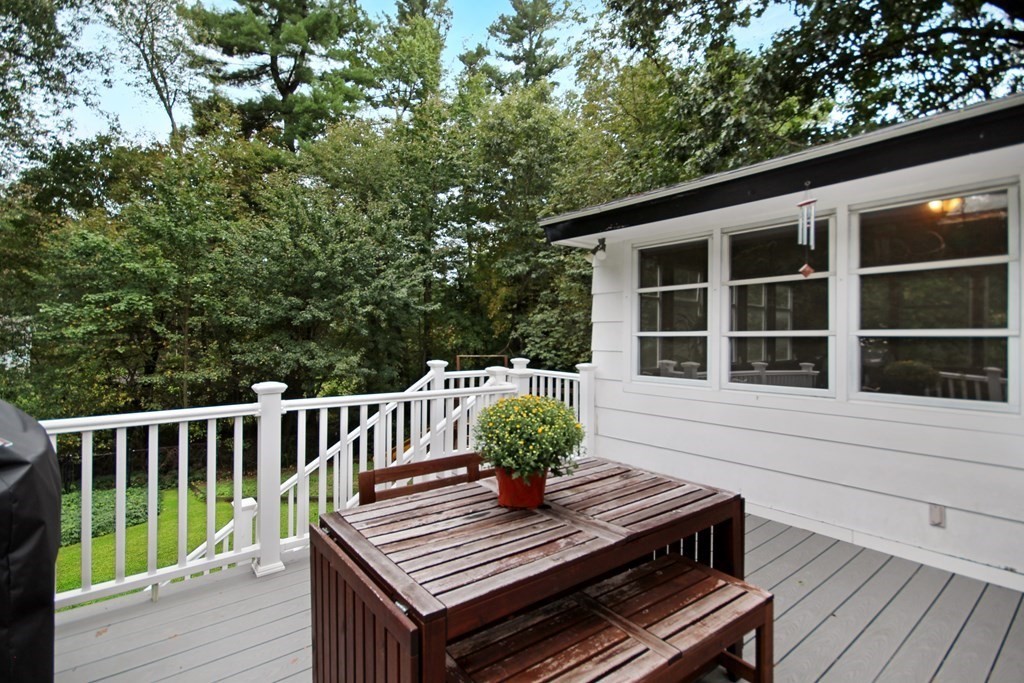 12 Prairie Road Chelmsford, MA 01824 - Photo 24 of 33 a view of balcony with wooden floor and outdoor seating