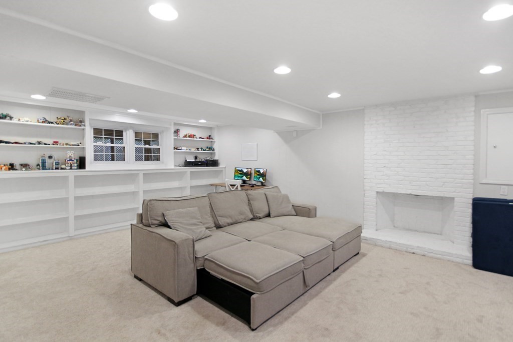 12 Prairie Road Chelmsford, MA 01824 - Photo 4 of 33 a living room with furniture and a view of kitchen