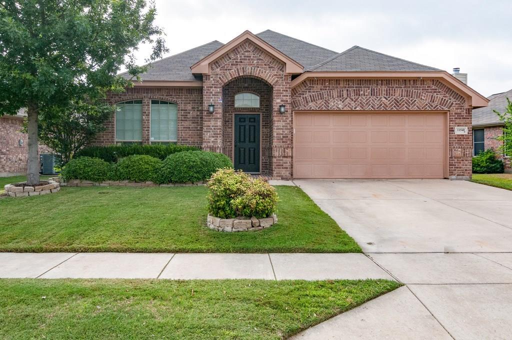 11540 Emory Trail Fort Worth, TX 76244 - Photo 1 of 1 a front view of a house with a garden and plants