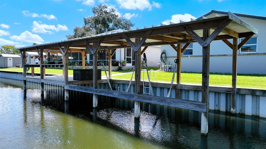 1069 9th Street Okeechobee, FL 34974 - Photo 12 of 48 swimming pool view with a seating space