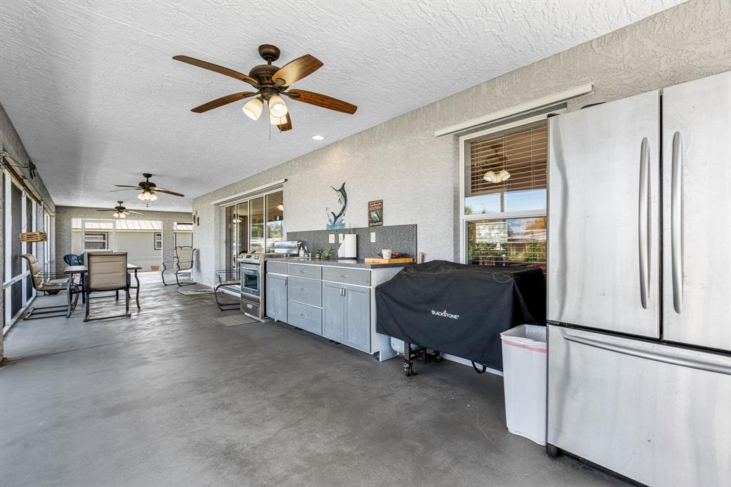 1069 9th Street Okeechobee, FL 34974 - Photo 34 of 48 a view of a livingroom with furniture and windows