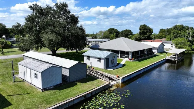 an aerial view of a house with roof deck