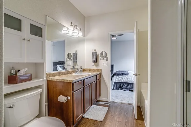 a room with a sink and a washer dryer