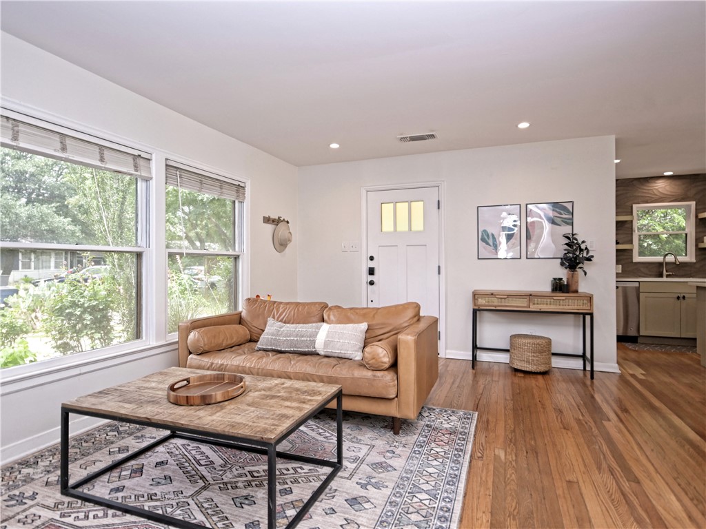 5707 Avenue F Austin, TX 78752 - Photo 17 of 17 a living room with furniture and a wooden floor