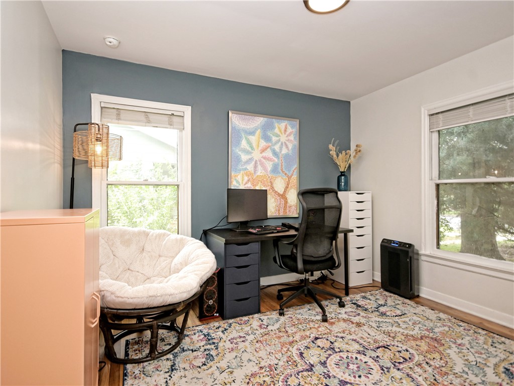 5707 Avenue F Austin, TX 78752 - Photo 8 of 17 a workspace with furniture and a window