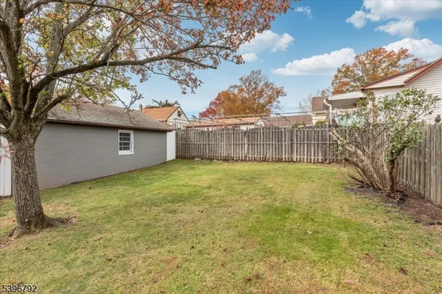 a backyard of a house with seating space