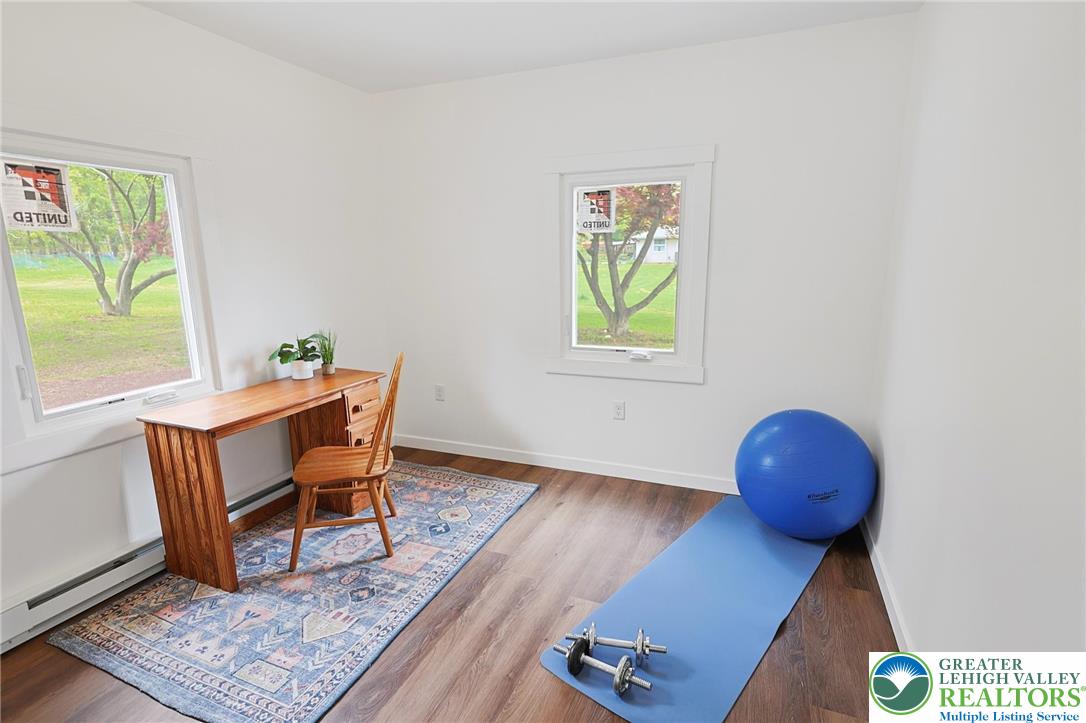 121 Ben Titus Road Tamaqua, PA 18252 - Photo 31 of 48 a workspace with furniture and wooden floor