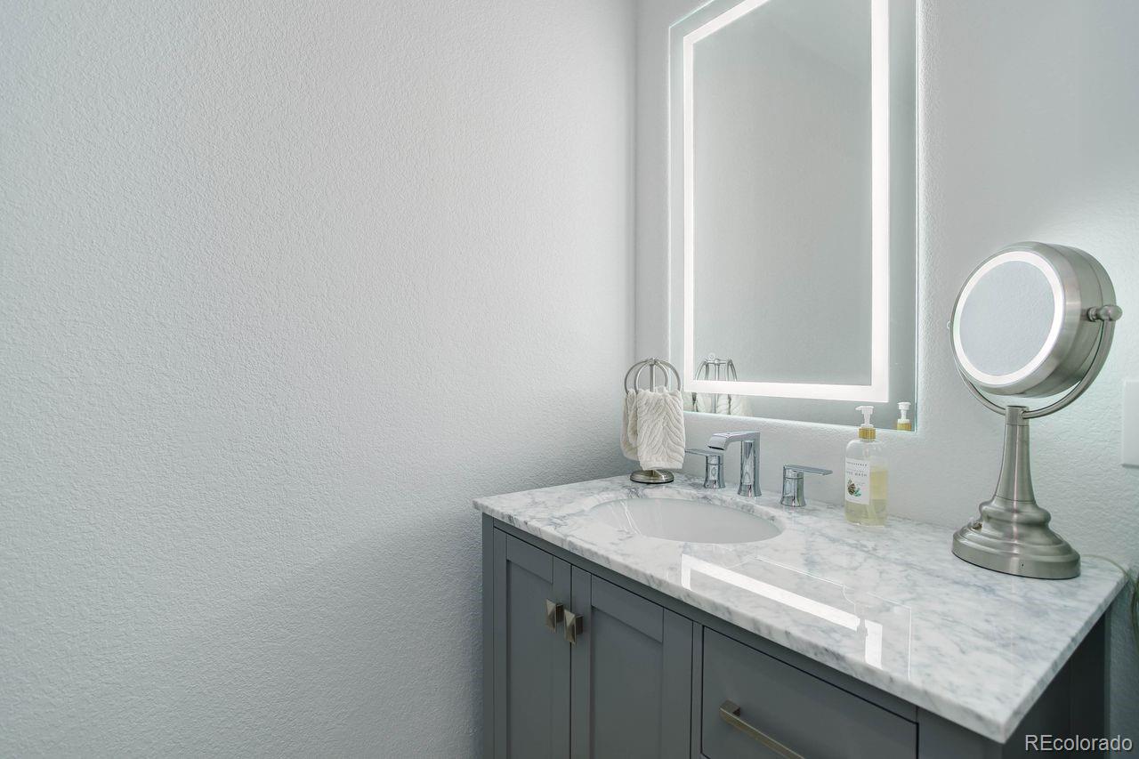 264 North Fork Road Grant, CO 80448 - Photo 16 of 34 a bathroom with a sink and a mirror