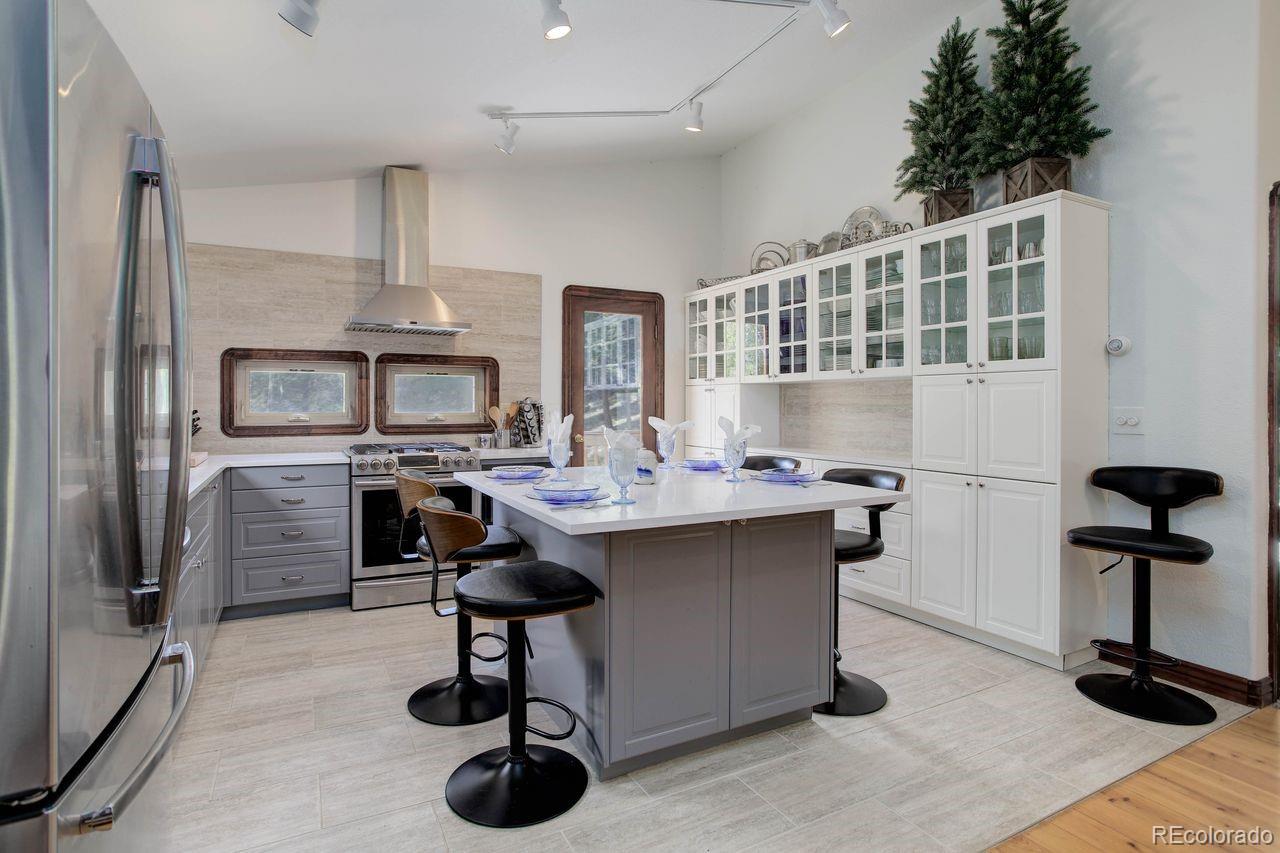 264 North Fork Road Grant, CO 80448 - Photo 3 of 34 a view of a workspace with furniture and bathroom