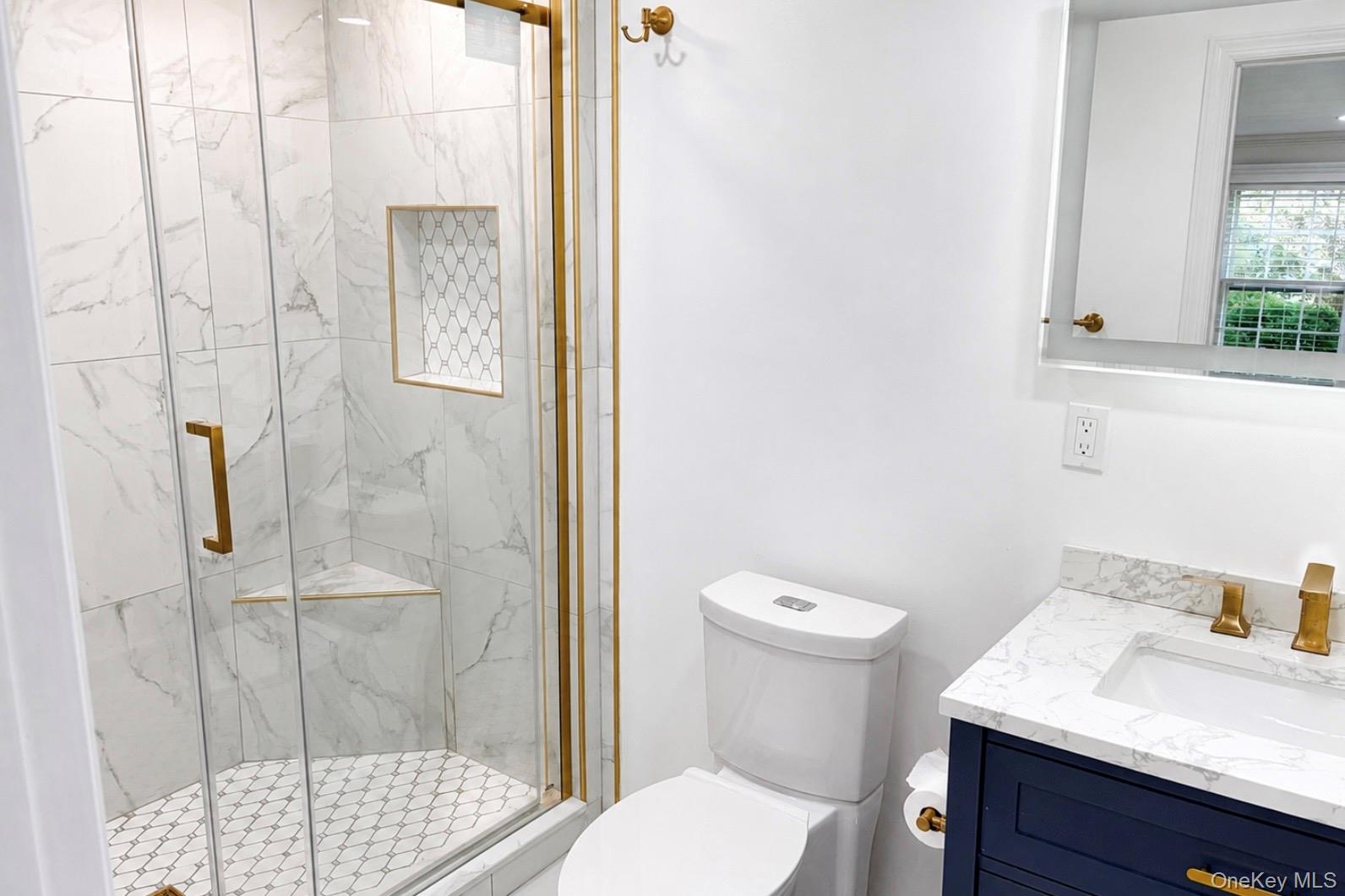 80 Mt Pleasant Road Smithtown, NY 11787 - Photo 12 of 27 a bathroom with a sink and toilet