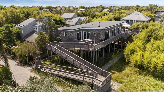 a view of a house with a roof deck