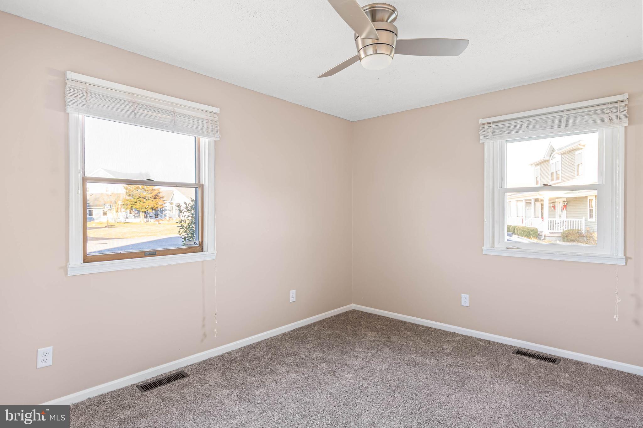 521 Harbor Road Ocean View, DE 19970 - Photo 26 of 32 an empty room with a window