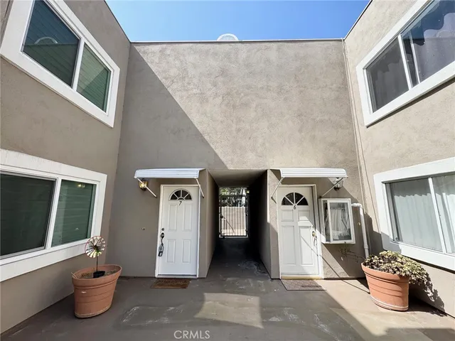 a front view of a house with parking