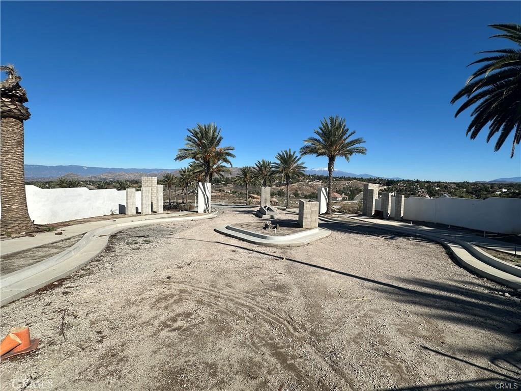 7570 Spencer Court Riverside, CA 92506 - Photo 4 of 5 a view of a swimming pool with a lounge chair