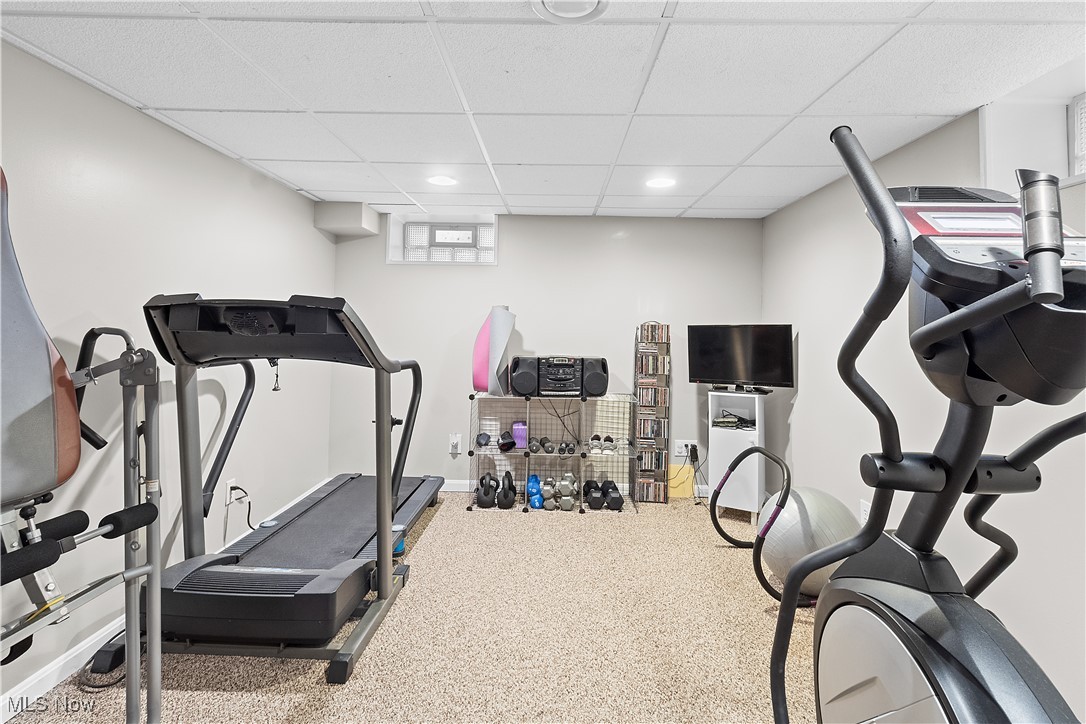 5225 Roseside Avenue Parma, OH 44134 - Photo 20 of 22 Exercise room featuring baseboards, recessed lighting, and a paneled ceiling