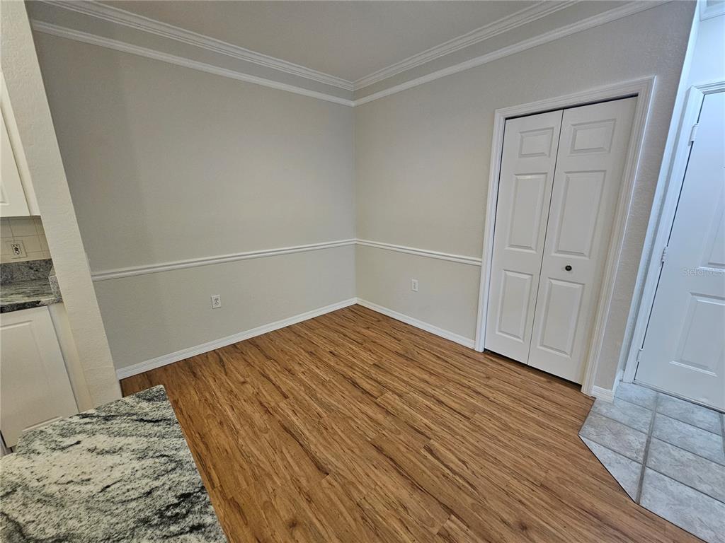 5174 Northridge Road, Unit 209 Sarasota, FL 34238 - Photo 9 of 25 a view of wooden floor