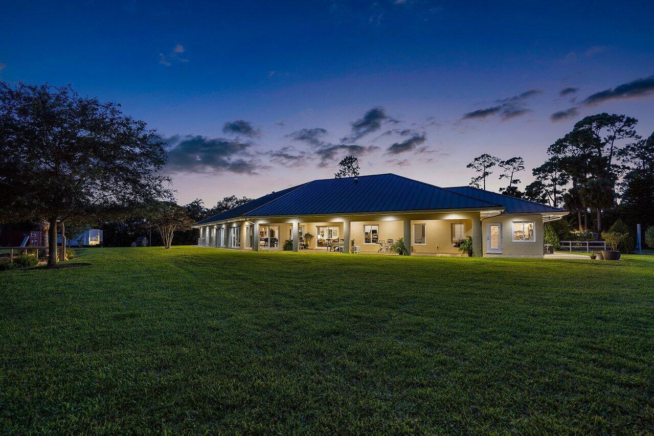 6624 Dillman Road Greenacres, FL 33413 - Photo 9 of 77 Twilight Backyard