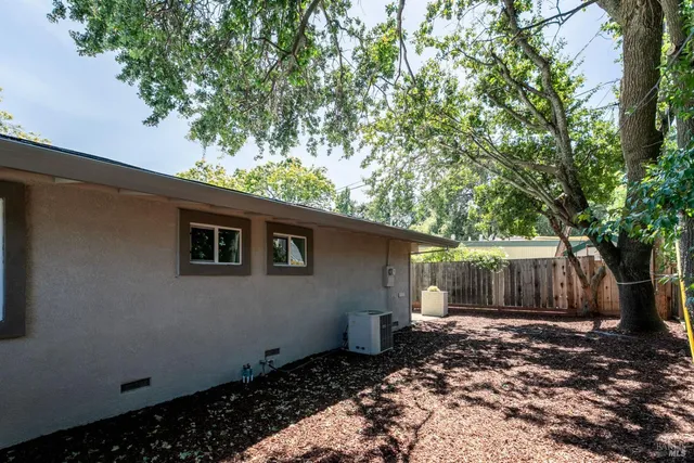 a backyard of a house with lots of green space