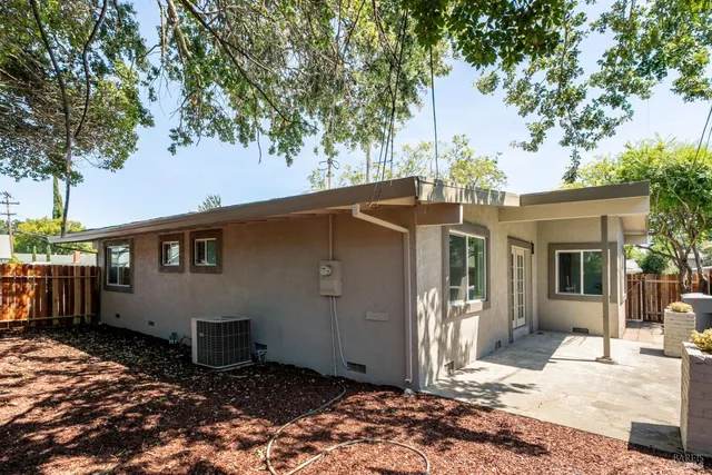 a view of a house with a patio