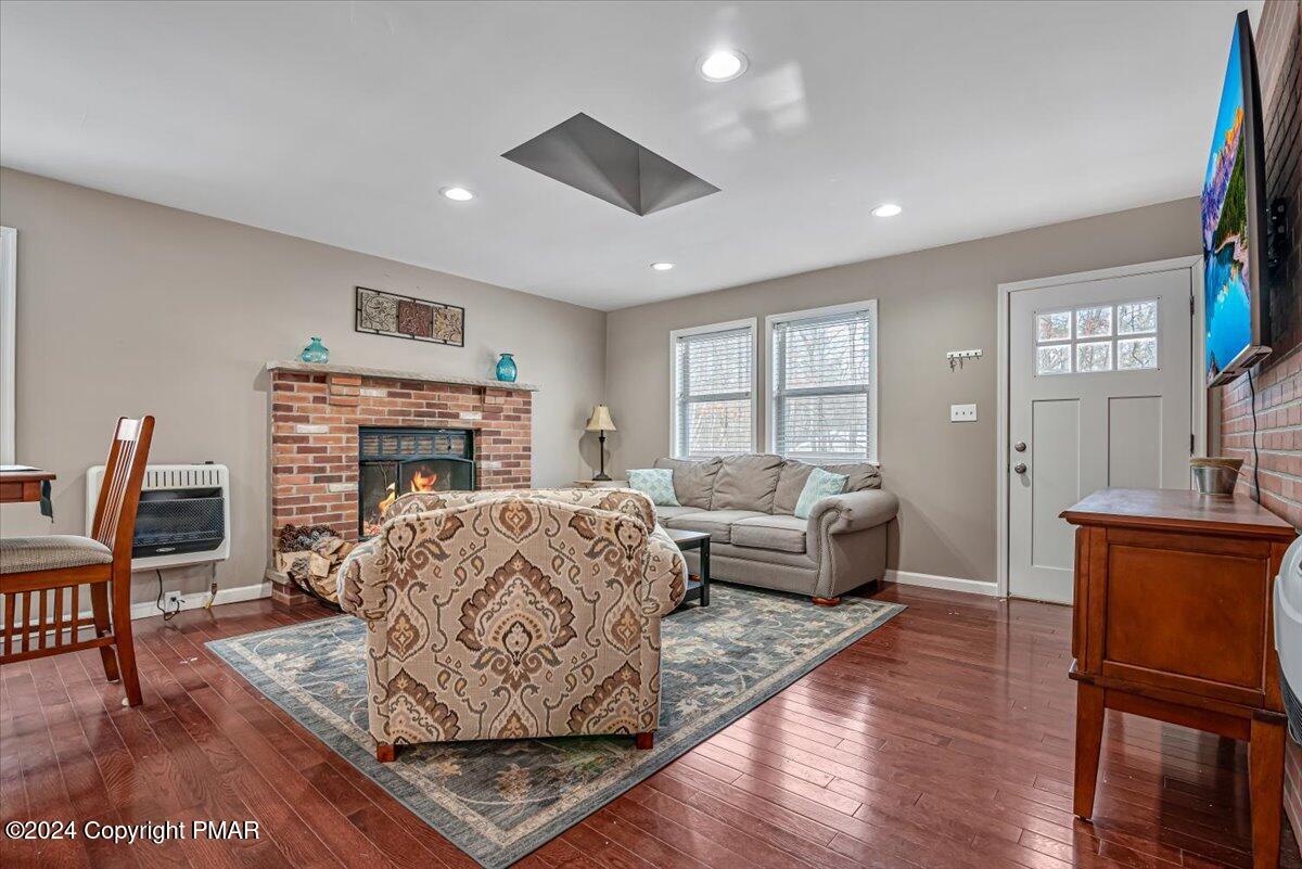 124 Rabbit Court Bushkill, PA 18324 - Photo 13 of 44 a living room with furniture and a fireplace