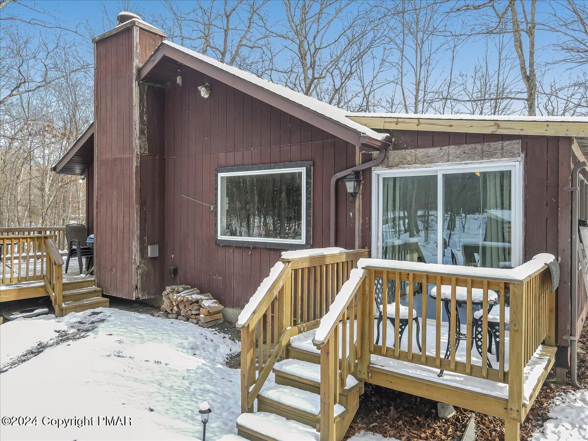 124 Rabbit Court Bushkill, PA 18324 - Photo 26 of 44 a view of a house with a wooden deck