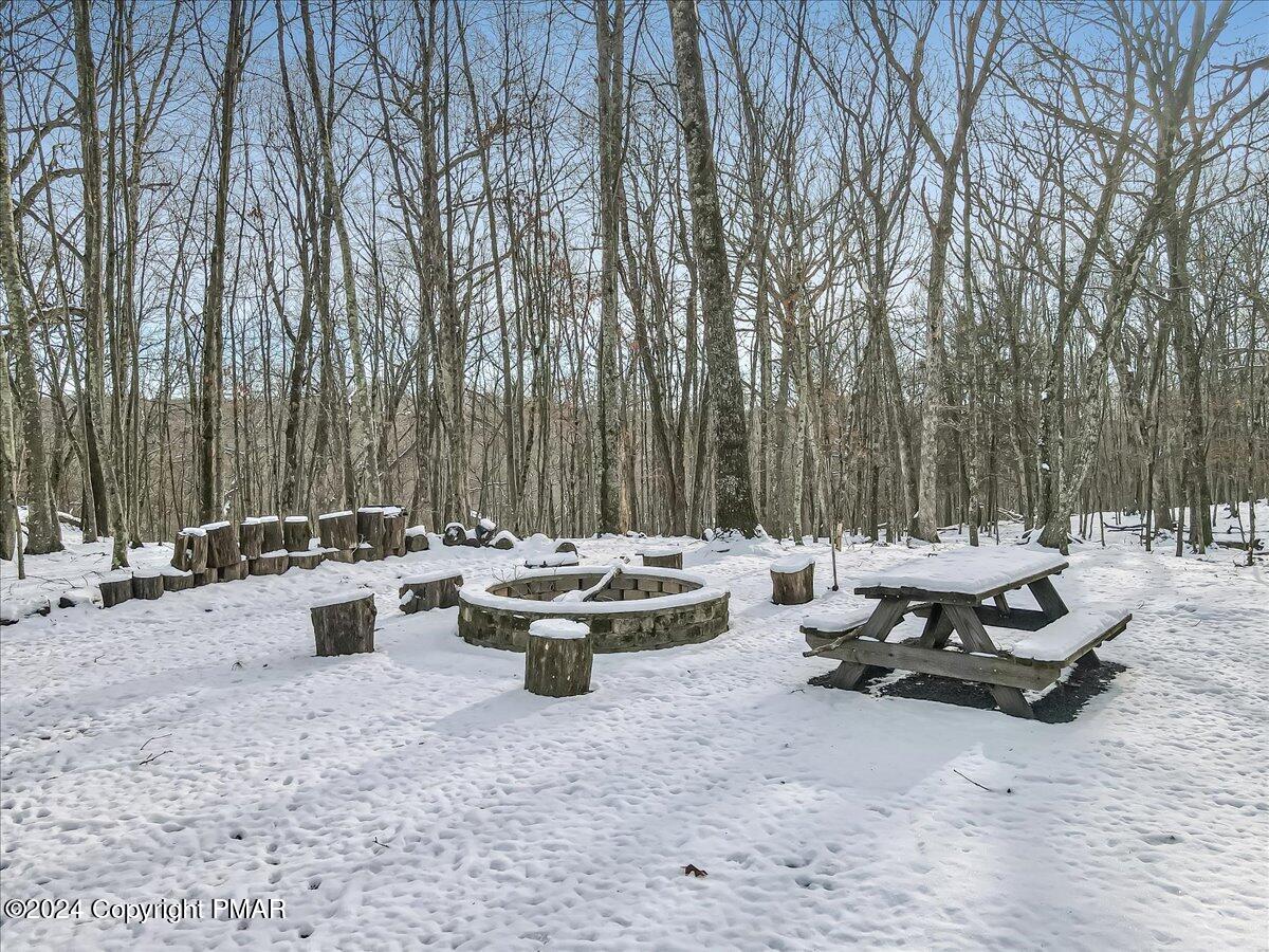 124 Rabbit Court Bushkill, PA 18324 - Photo 31 of 44 a view of a patio with fire pit