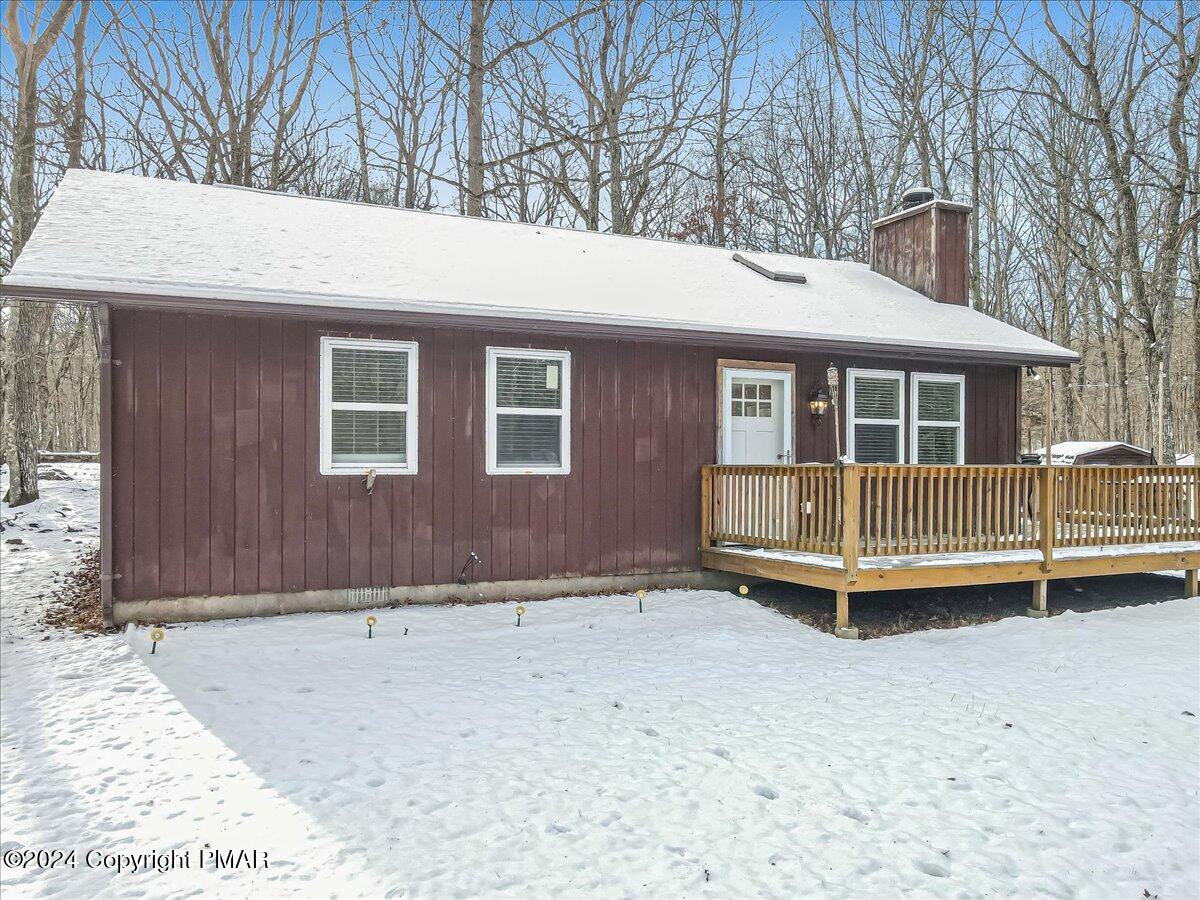 124 Rabbit Court Bushkill, PA 18324 - Photo 7 of 44 a view of backyard with deck and backyard