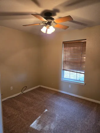 a view of a small space with a window
