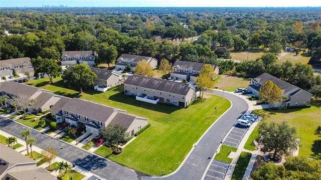an aerial view of a swimming pool patio and mountain view