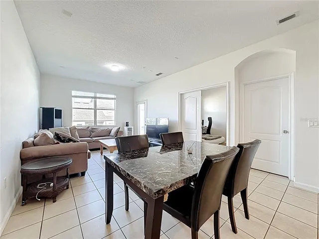 a view of a dining room with furniture
