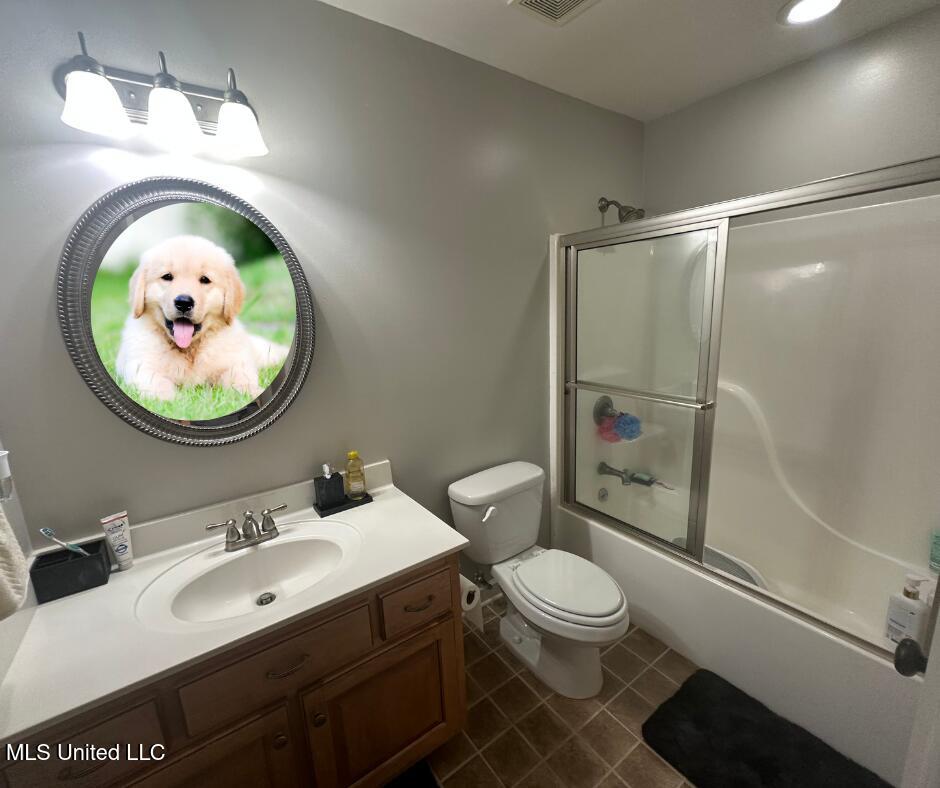 4185 Laws Hill Road Waterford, MS 38685 - Photo 26 of 30 Puppy in mirror