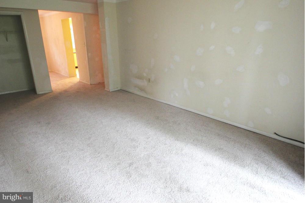 3934 Bel Pre Road, Unit 1 Silver Spring, MD 20906 - Photo 3 of 12 a view of an empty room and a window