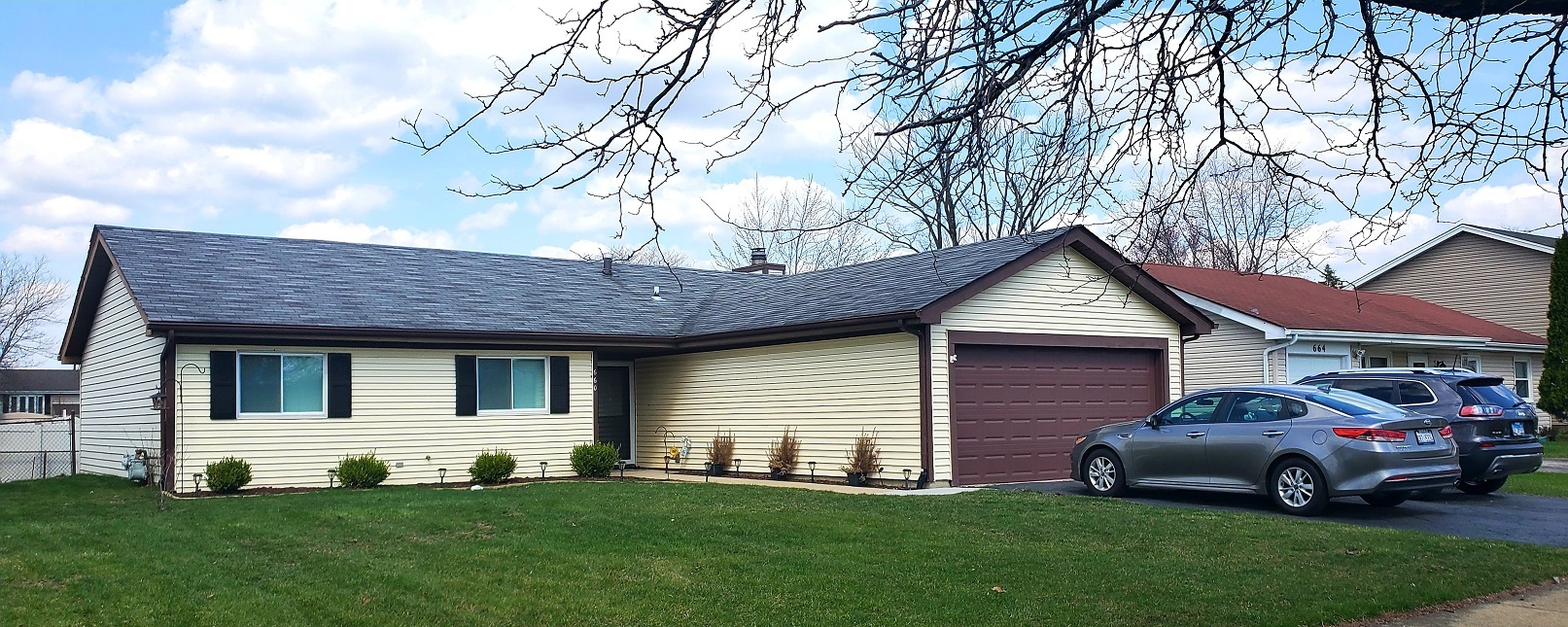 660 Niagara Drive Bolingbrook, IL 60440 - Photo 1 of 28 a front view of a house with a garden and yard