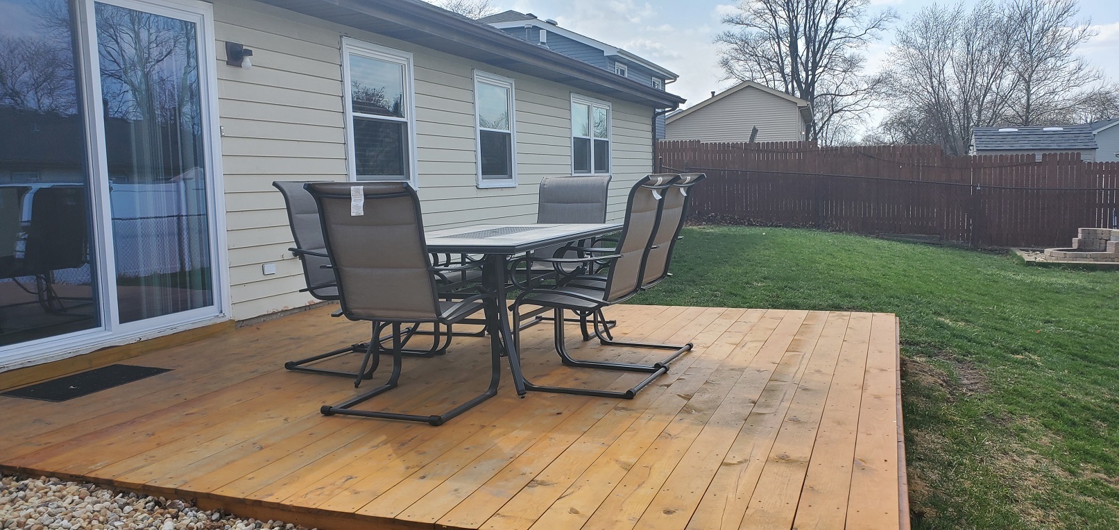 660 Niagara Drive Bolingbrook, IL 60440 - Photo 27 of 28 a view of a backyard with table and chairs