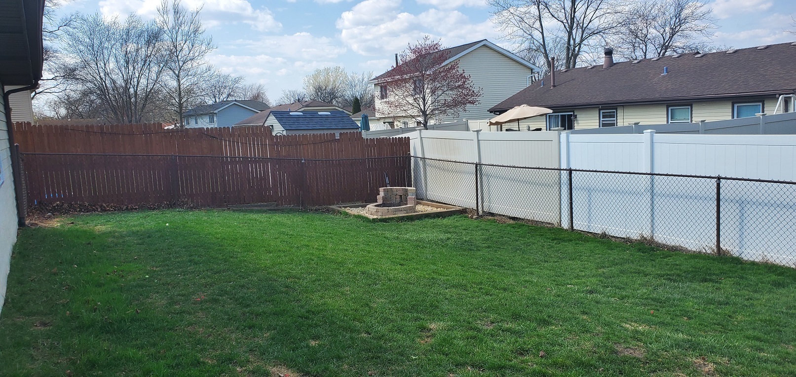 660 Niagara Drive Bolingbrook, IL 60440 - Photo 28 of 28 a backyard of a house with a garden and yard