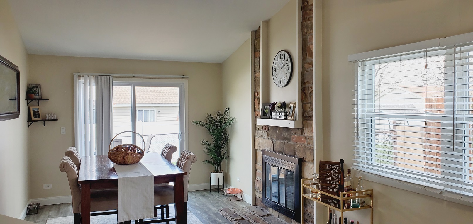 660 Niagara Drive Bolingbrook, IL 60440 - Photo 10 of 28 a view of dining room and livingroom with furniture wooden floor windows and tub