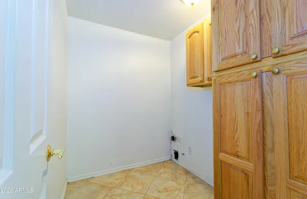 a view of a room with wooden walls