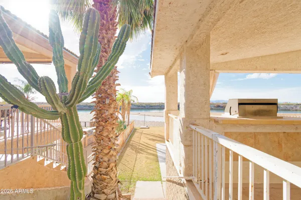 a view of balcony with two trees