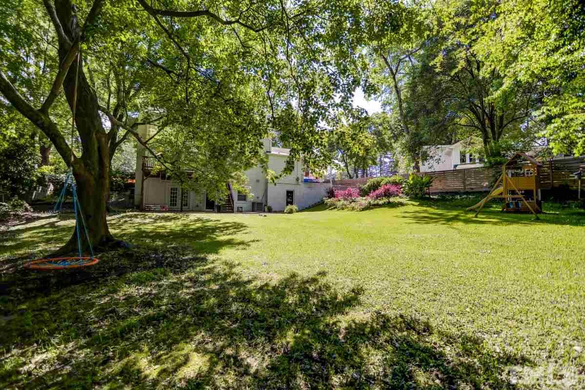 908 Currituck Drive Raleigh, NC 27609 - Photo 22 of 22 a view of a house with a yard