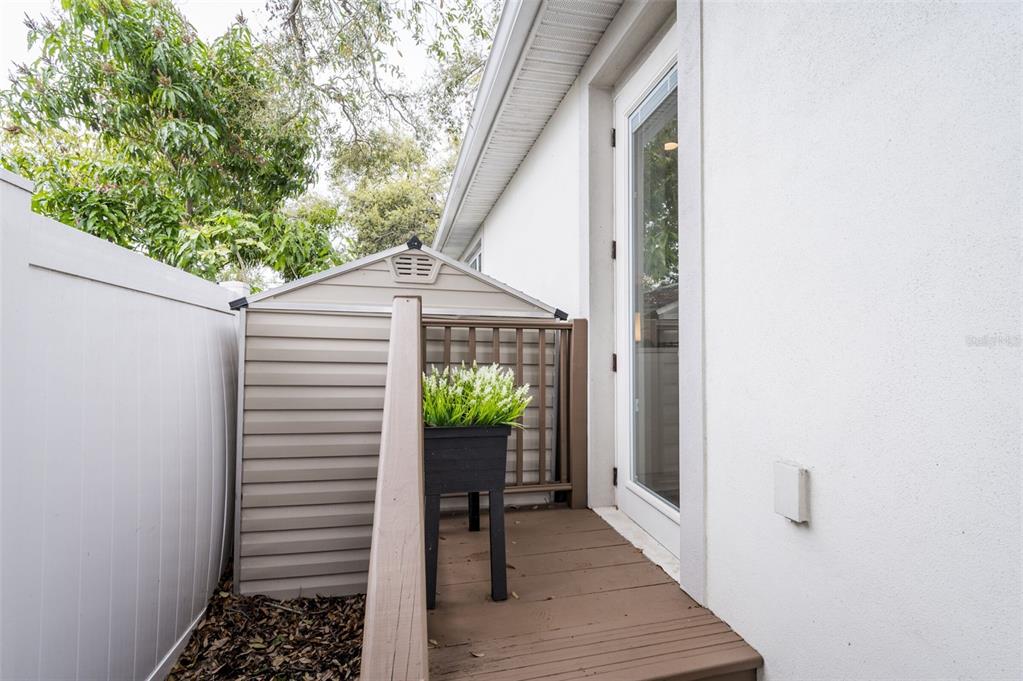3405 West Cherry Street Tampa, FL 33607 - Photo 39 of 41 a view of a house with backyard and sitting area