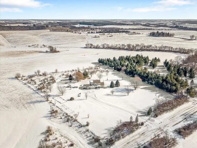 a view of a balcony with furniture