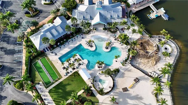 an aerial view of a house with garden space and street view