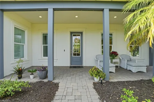 a front view of a house with patio