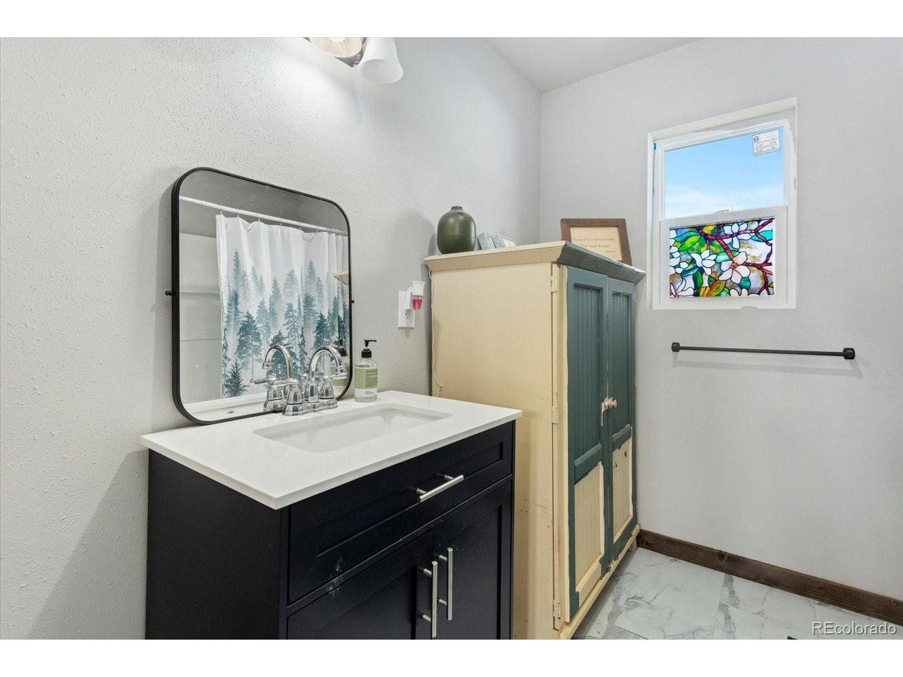 51624 Co Road Villa Grove, CO 81155 - Photo 20 of 50 a kitchen with stainless steel appliances a refrigerator and a sink